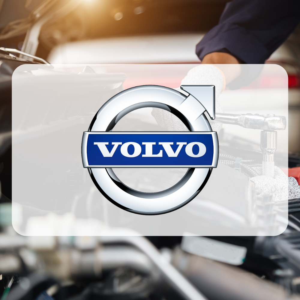 Volvo logo overlay on a blurred background of a person working on a car.
